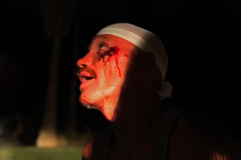 © Richard Street - "Chucky," a Bulldog gang member, refuses to identify the Norteno gang member who had attacked him.