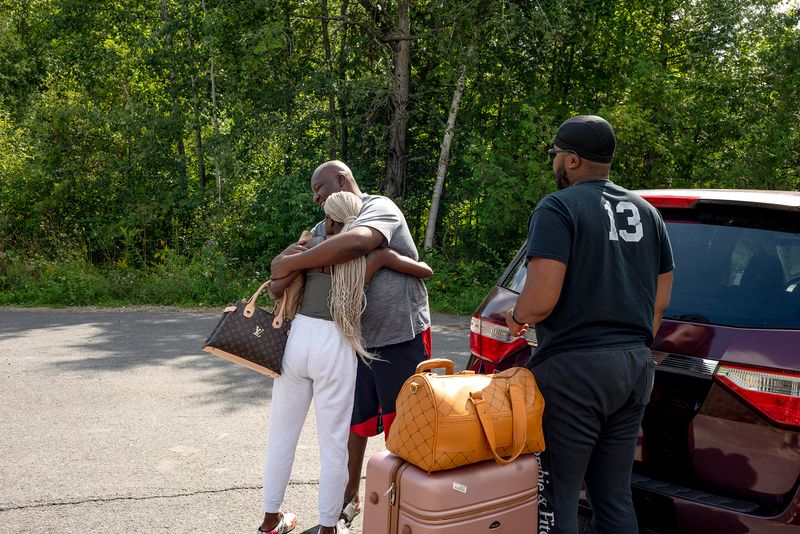 © Ruth Kaplan - Asylum-seeker dropped off at Roxham Road border site.
