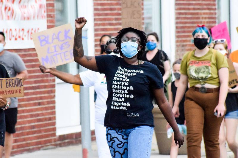 © Ash Esposito ~ Little Box of Random - Organizer Amina Carter leading the Juneteenth march through Arbutus, Maryland