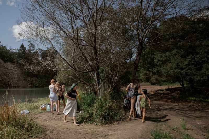 © Tajette O'halloran - A group of people packing up and leaving the quarry