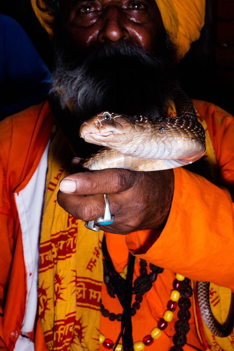 © Kanrapee Chokpaiboon - A priest and his snake. (snake charming)