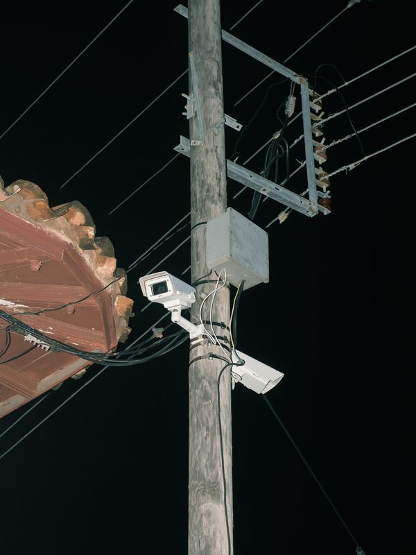 © Mattia Micheli - Trinidad, Cuba, 2022. One of the first surveillance cameras installed on the island to monitor public areas.