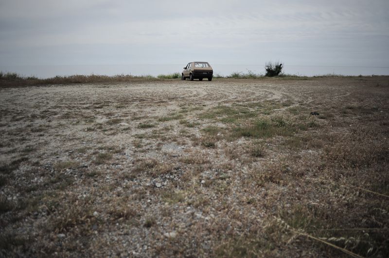 © Domenico Fabio Itri - An abandoned car on the edge of route SS106.