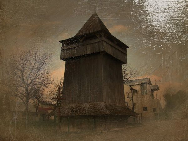 © Andrei  Kolyaskin - Old  belfry  from  15th  century  in  town  Drogobych  of  Lviv  region , Ukraine .