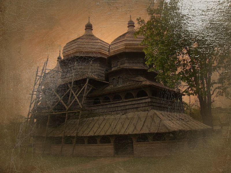 © Andrei  Kolyaskin - Wooden  Saint  Jur  Church  from  15th  century  in  town  Drogobych  of  Lviv  region , Ukraine .