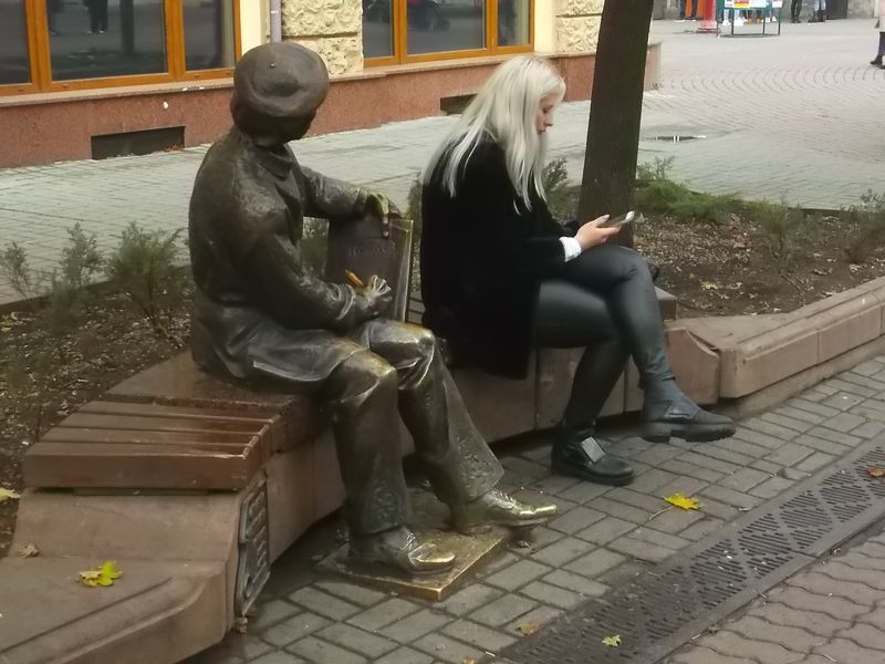 © Andrei  Kolyaskin - Monument  of  ukrainian  painter  Opanas  Zalyvakha  and  old  woman  in  Ivano - Frankivsk  City , Ukraine .