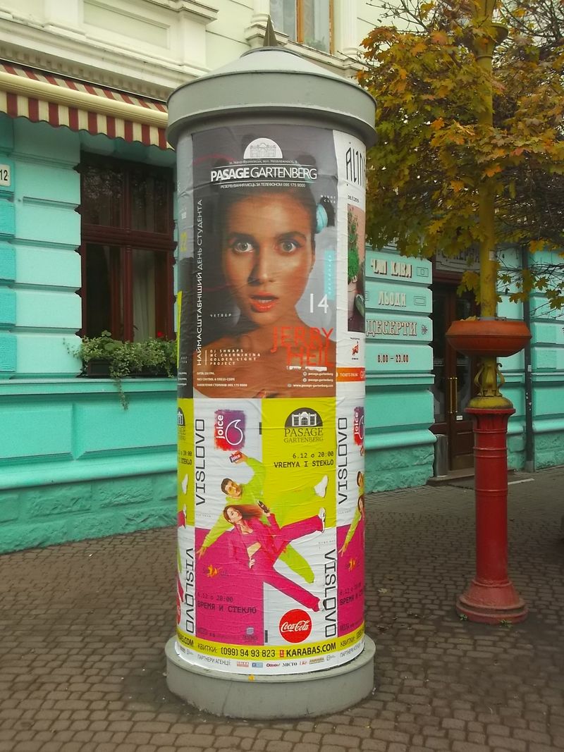 © Andrei  Kolyaskin - Advertising  pole  in  Ivano - Frankivsk  City , Ukraine .