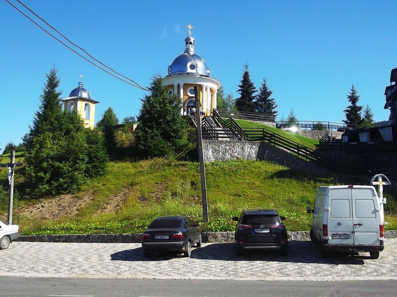© Andrei  Kolyaskin - Orthodox  Temple  and  belfry  on  the  Synevir  pass  in  Mezhygirya  area  of  Zacarpatian  region , Ukraine .