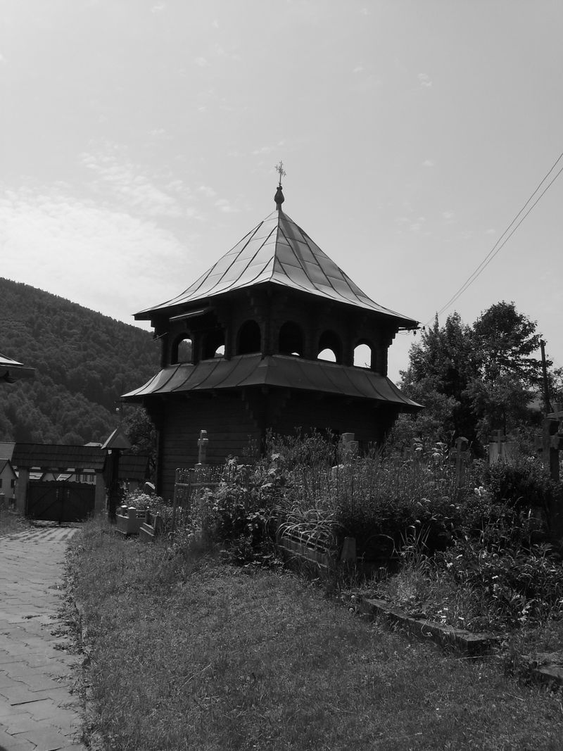 © Andrei  Kolyaskin - Wooden  belfry  in  Carpatian  town  Yaremche  of  Ivano - Frankivsk  region , Ukraine .