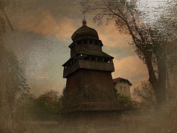 © Andrei  Kolyaskin - Old  belfry  from  15th  century  in  town   Drogobych  of  Lviv  region , Ukraine .
