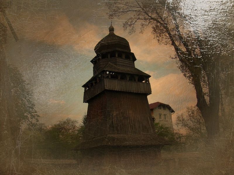© Andrei  Kolyaskin - Old  belfry  from  15th  century  in  town   Drogobych  of  Lviv  region , Ukraine .