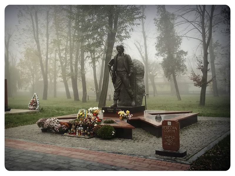 © Andrei  Kolyaskin - Foggy  morning  in  Memorial  Square  of  Ivano - Frankivsk  City , Ukraine .