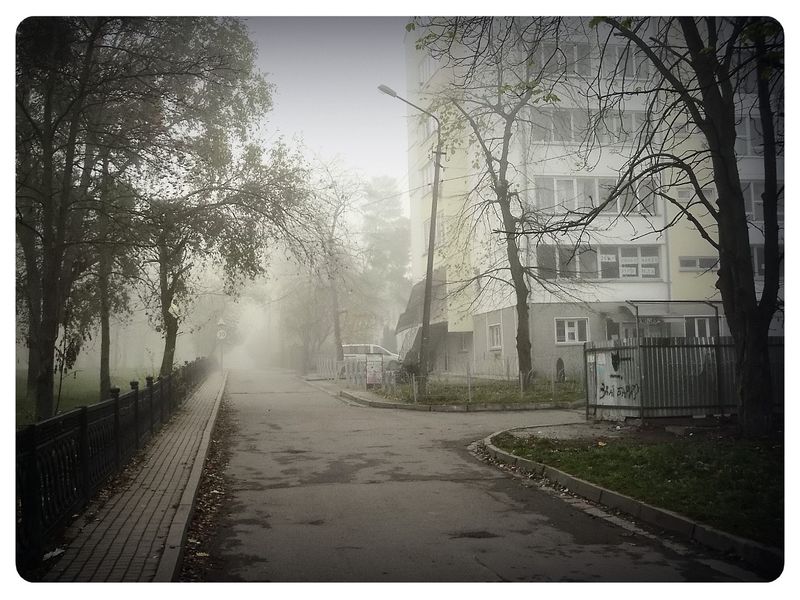 © Andrei  Kolyaskin - Foggy  morning  in  Ivano - Frankivsk  City , Ukraine .