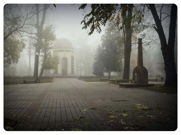 © Andrei  Kolyaskin - Foggy  morning  in  Memorial  Square  of  Ivano - Frankivsk  City , Ukraine .