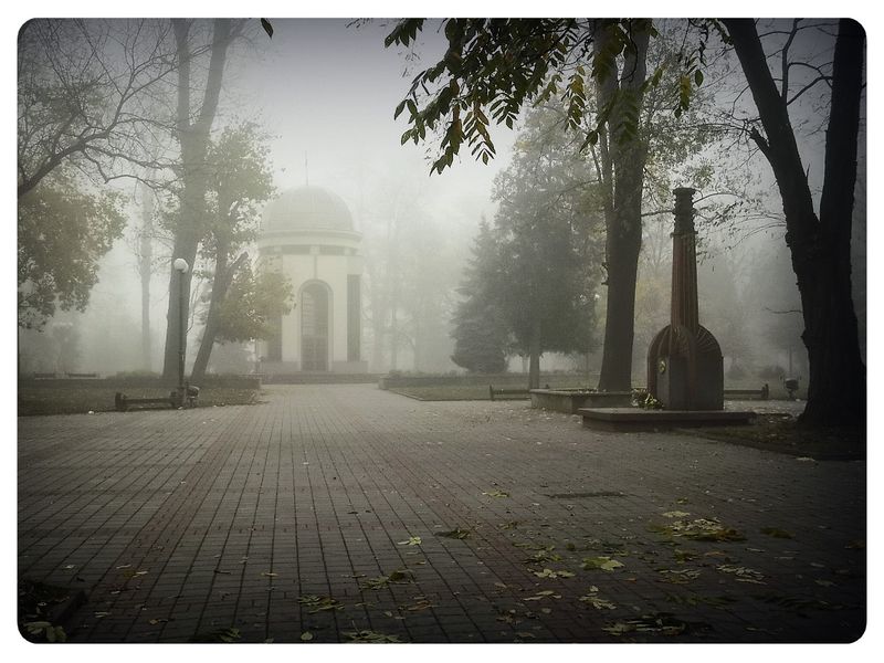 © Andrei  Kolyaskin - Foggy  morning  in  Memorial  Square  of  Ivano - Frankivsk  City , Ukraine .