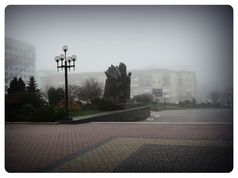 © Andrei  Kolyaskin - Foggy  morning  in  Ivano - Frankivsk  City , Ukraine .