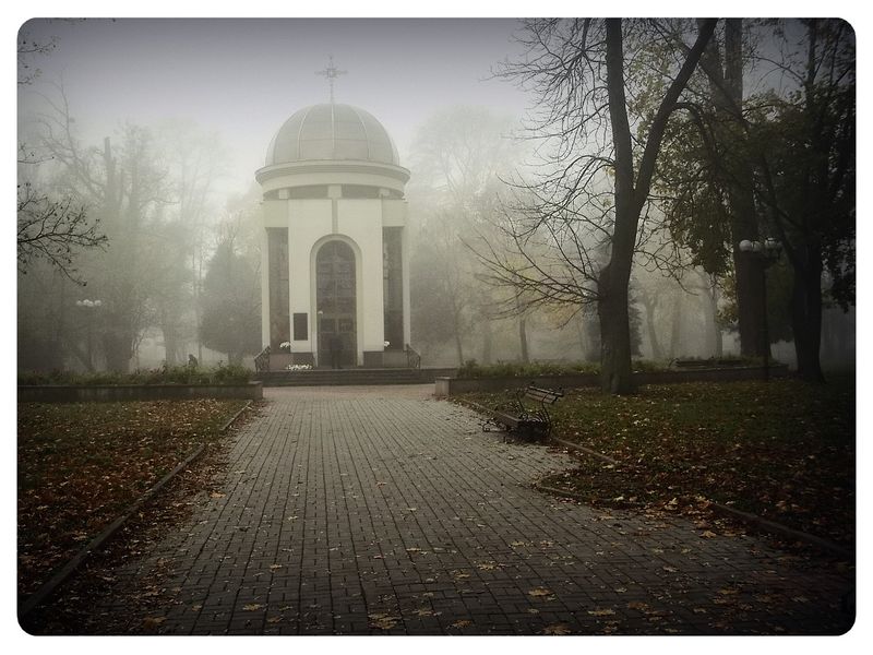 © Andrei  Kolyaskin - Foggy  morning  in  Memorial  Square  of  Ivano - Frankivsk  City , Ukraine .
