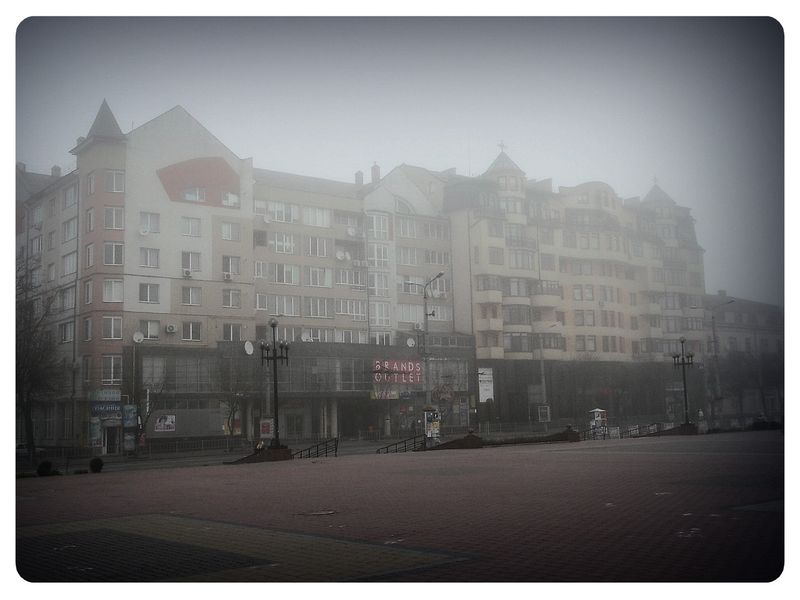 © Andrei  Kolyaskin - Foggy  morning  in  Ivano - Frankivsk  City , Ukraine .