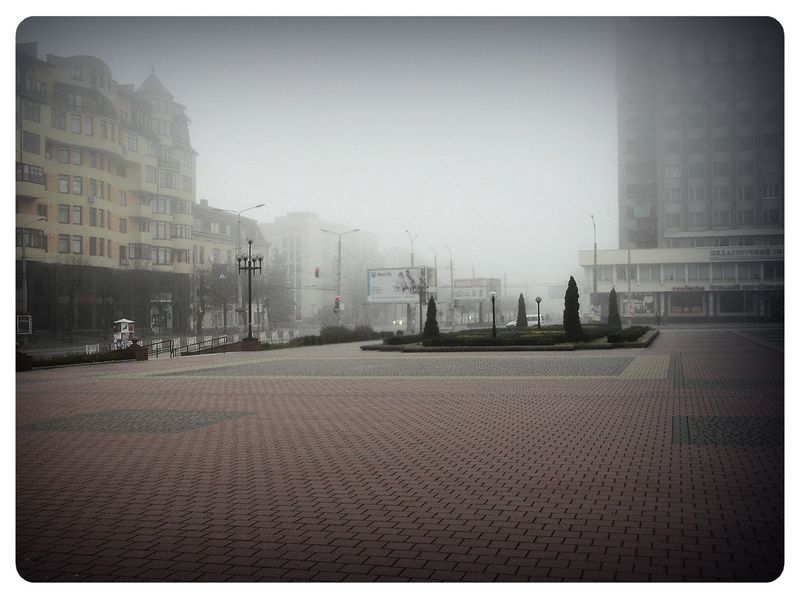 © Andrei  Kolyaskin - Foggy  morning  in  Ivano - Frankivsk  City , Ukraine .
