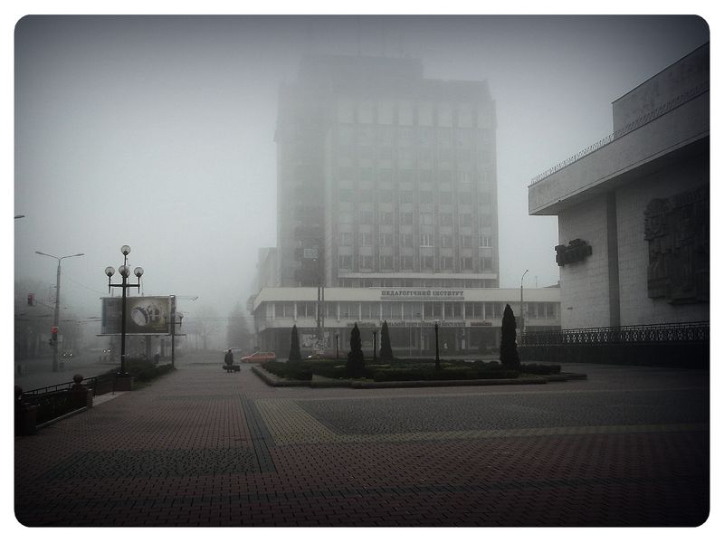 © Andrei  Kolyaskin - Foggy  morning  in  Ivano - Frankivsk  City , Ukraine .