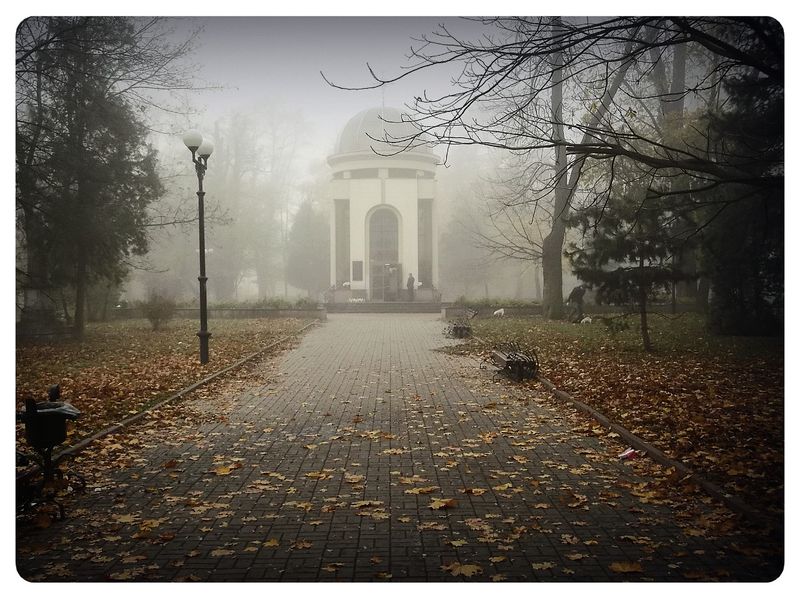 © Andrei  Kolyaskin - Foggy  morning  in  Memorial  Square  of  Ivano - Frankivsk  City , Ukraine .