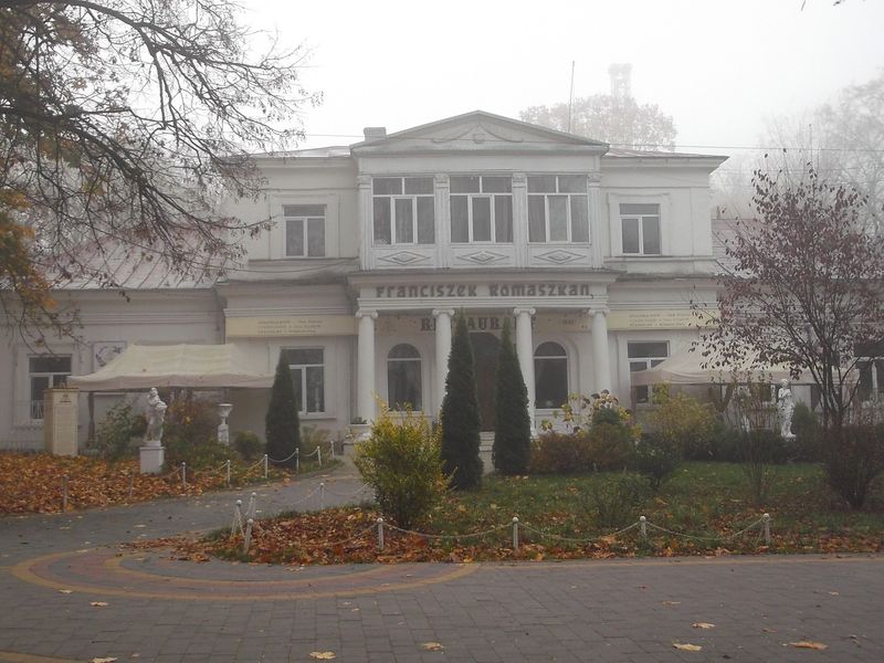 © Andrei  Kolyaskin - Foggy autumn morning on the central park of Ivano - Frankivsk City , Ukraine .