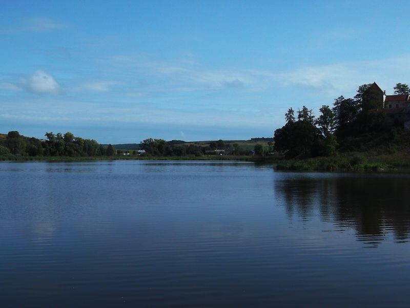 © Andrei  Kolyaskin - Lake  near  Svirzh  Castle  from  15th  century  in  village  Svirzh  of  Lviv  region , Uktaine .