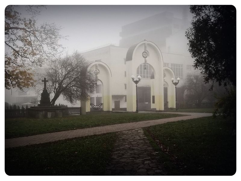 © Andrei  Kolyaskin - Foggy  autumn  morning  on  the  Memorial  Square  of  Ivano - Frankivsk  City , Ukraine .