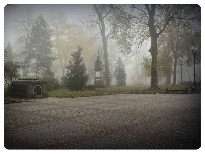 © Andrei  Kolyaskin - Foggy  autumn  morning  on  the  Memorial  Square  of  Ivano - Frankivsk  City , Ukraine .