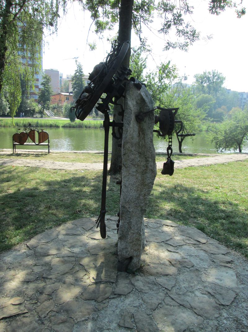 © Andrei  Kolyaskin - Forged  sculpture  on  the  Love  Island  on  the  City  Lake  of  Ivano - Frankivsk  City , Ukraine .
