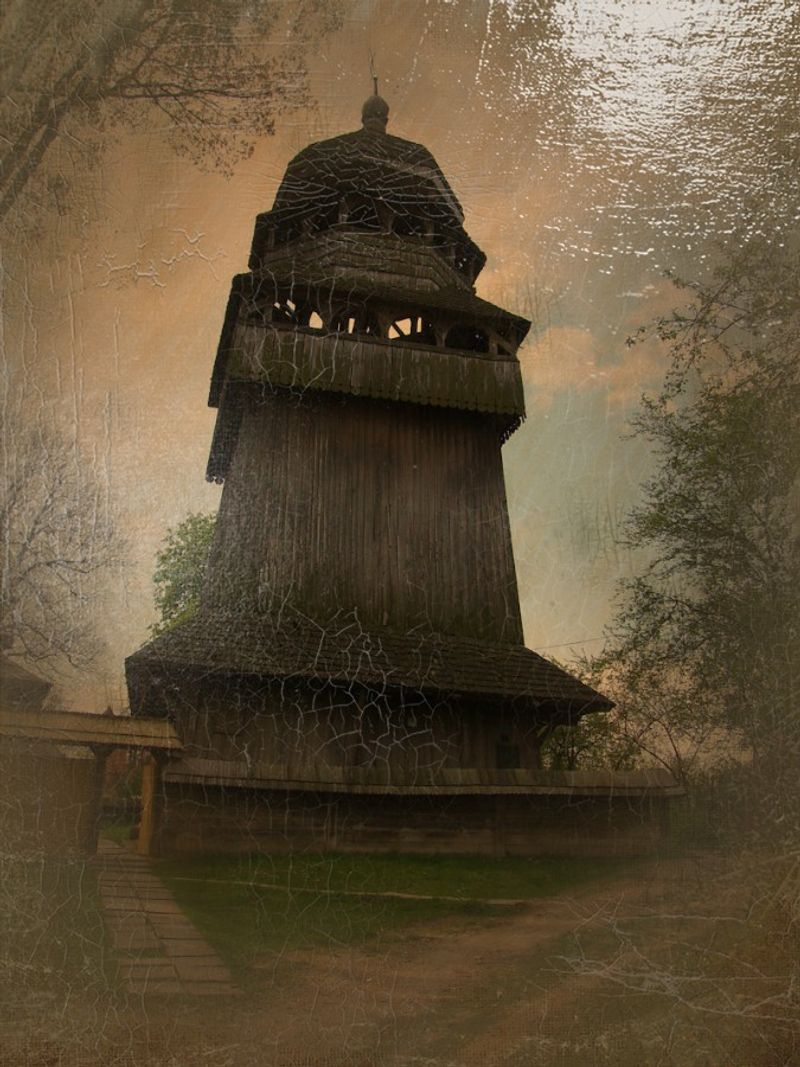 © Andrei  Kolyaskin - Old  belfry  from  15th  century  in  town  Drogobych  of  Lviv  region , Ukraine .