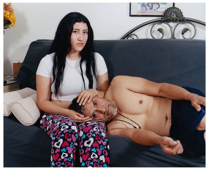 © Noel Quintela - Prima and uncle at home, Rialto CA, 2023.