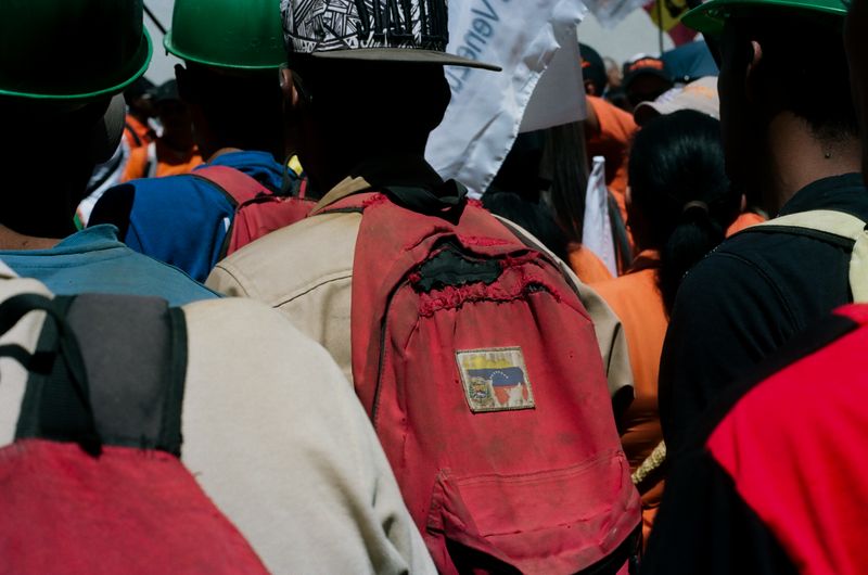 © Jose Menendez - worn backpack. Caracas, Venezuela. 2024.