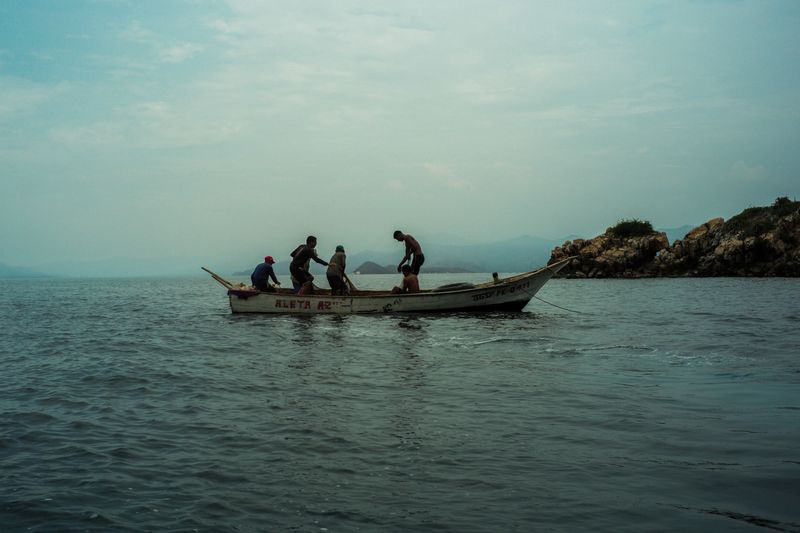 © Jose Menendez - Net fishing. Mochima, Sucre, Venezuela. 2024.