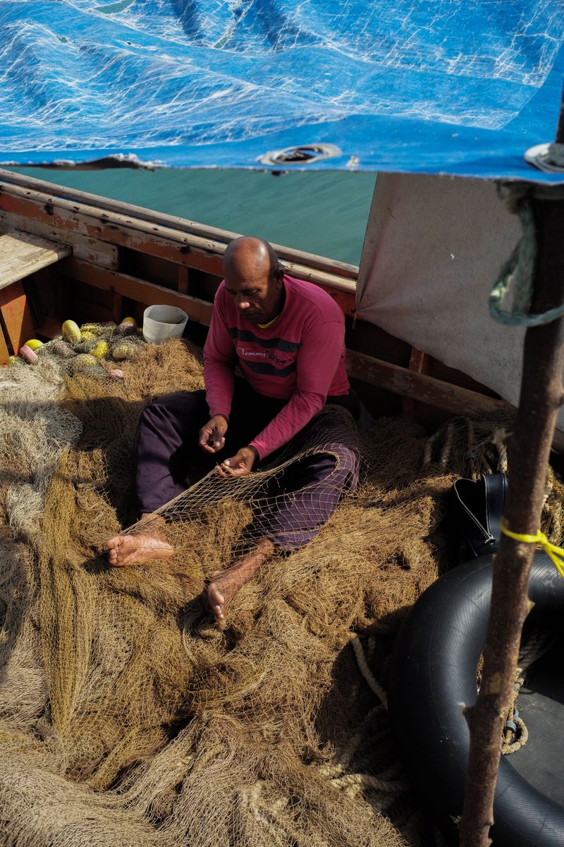 © Jose Menendez - Mending nets. Mochima, Sucre, Venezuela. 2024.