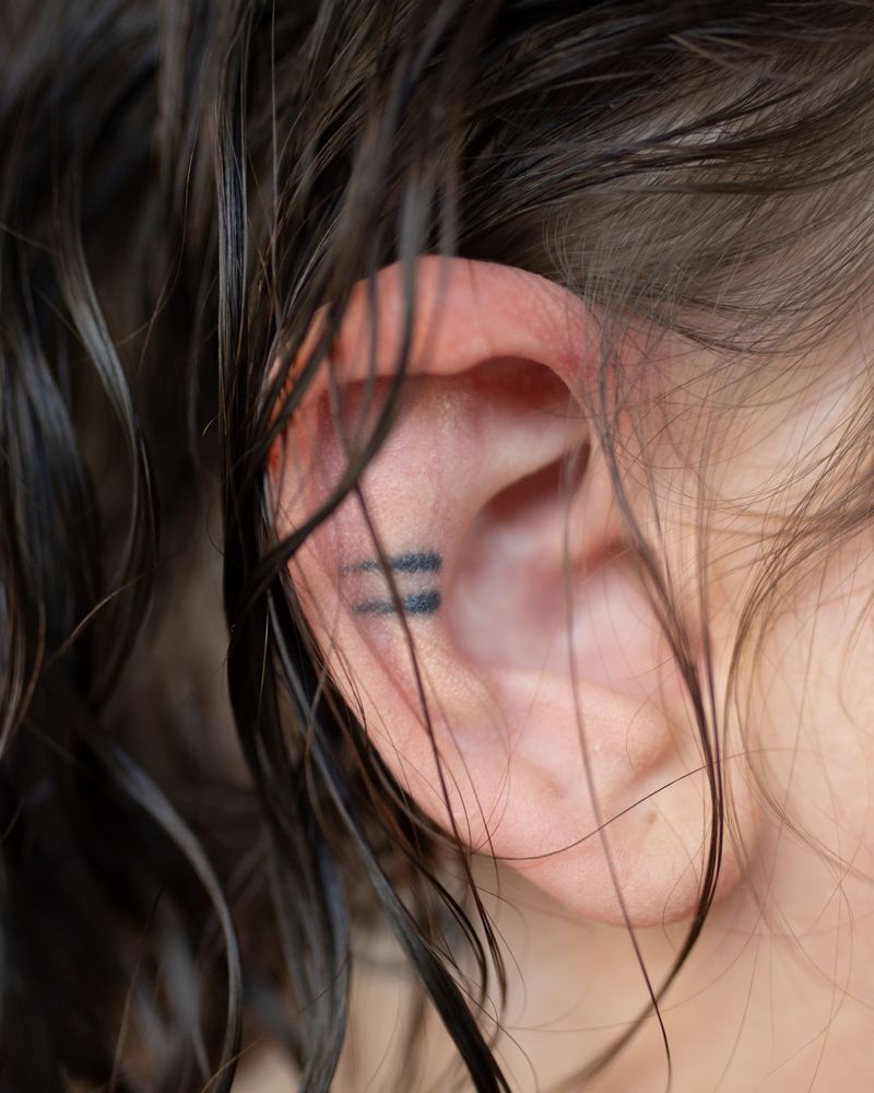 © Chloe Scout Nix - self portrait ear, 2023. 32x40 in. fabric coated vinyl paper.