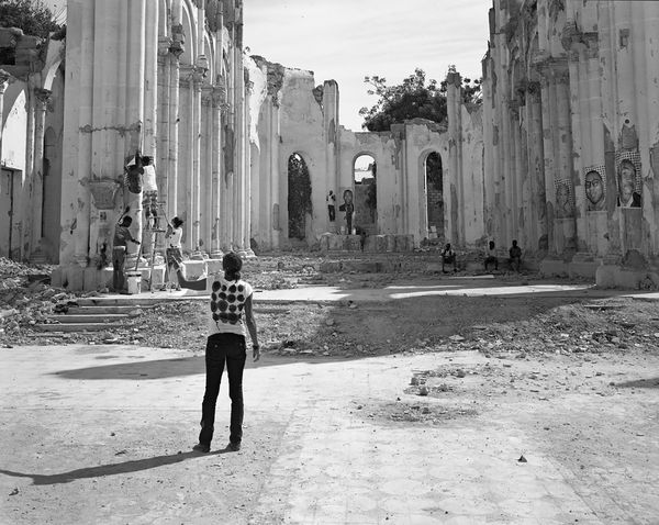 © Laura Heyman - Volunteers Installing JR’s “Rising Souls Haiti”, Cathédrale Notre-Dame de Port-au-Prince, 2012