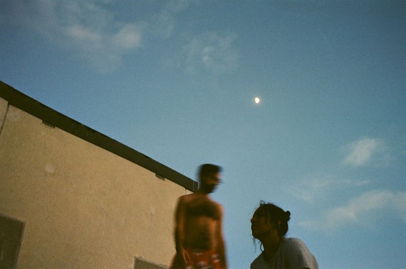© Anneke Paterson - Childhood friends on a rooftop. 2018.