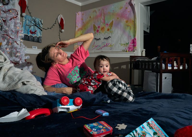 © Stacy Kranitz - Elayna's celebrates her first Christmas at home with her parents while they continue to struggle with sobriety.