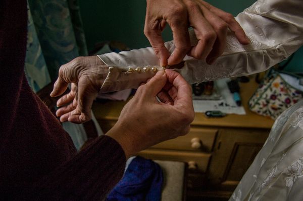 © Leticia Valverdes - Patricia is helped by daughter Lou who had never seen her mum on her wedding dress