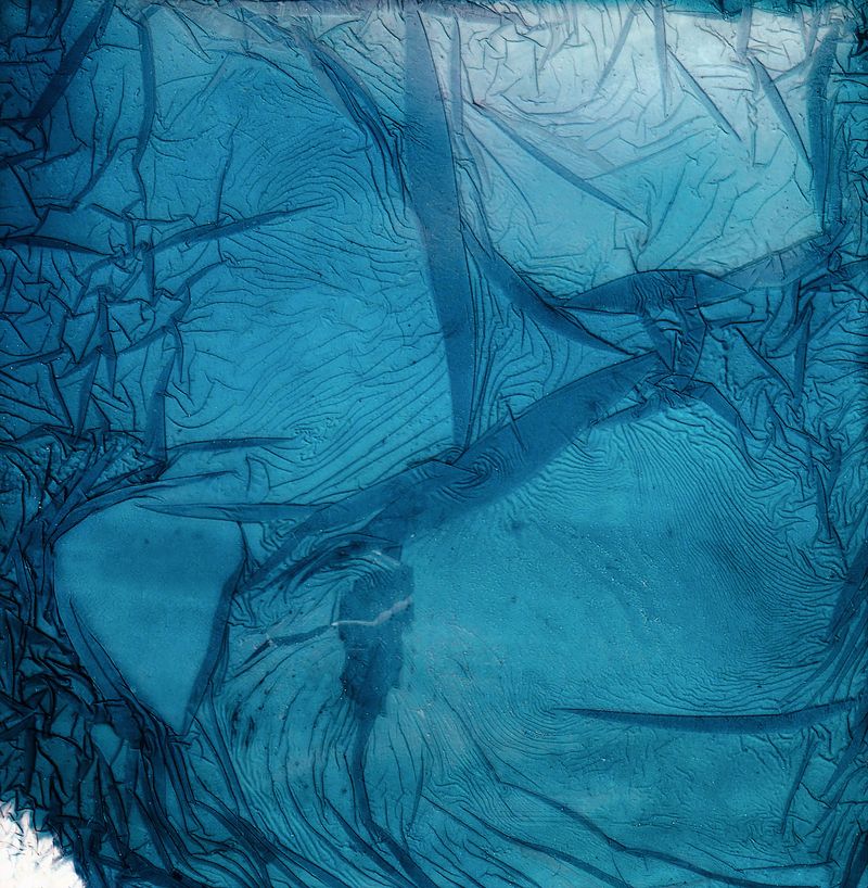 © Claire Eggers - Polaroid decay soaked in glacier runoff water