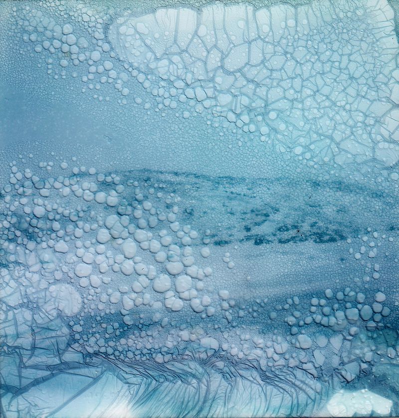 © Claire Eggers - Polaroid decay soaked in glacier runoff water