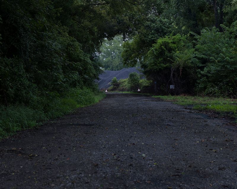 © Allison Grant - Petroleum Coke Storage Near the School
