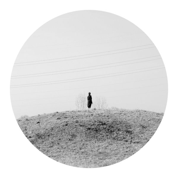 © Tianhu Yuan - Along the Wei River. It is a riverside park now. A woman is standing on a mound.