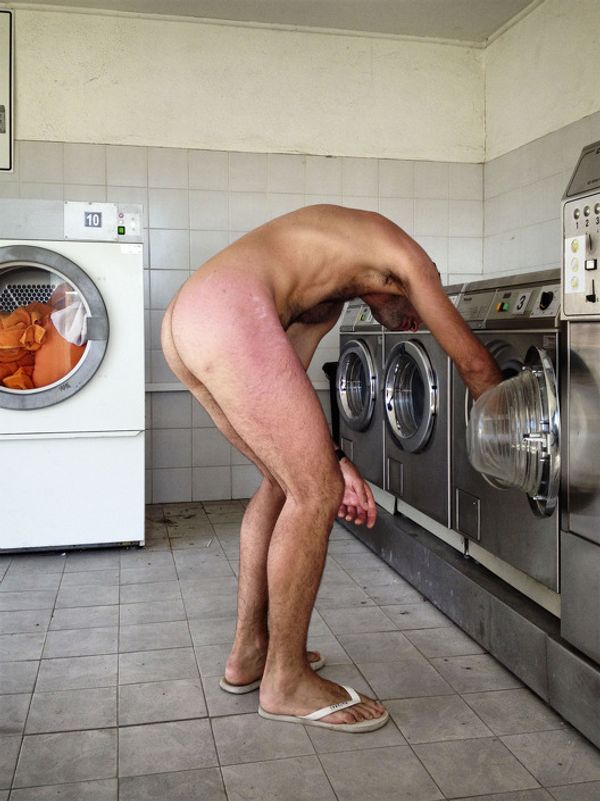 © Stefano Morelli - The extraordinary normality of daily-life lived in the largest naturist resort in Europe. At laundromat.