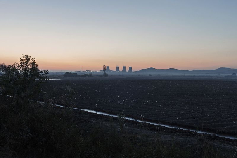 © Stefano Morelli - Arshaluys, Armenia. A view of the Metsamor Nuclear Power Plant from the house of Manvel and Ruzan.