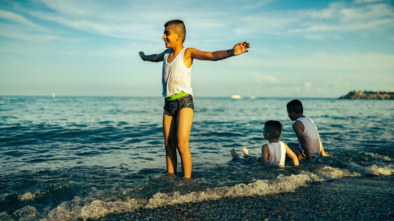 © Hong Yu Chan - Toronto, Canada, 2023Childhood suspended between sea and horizon.