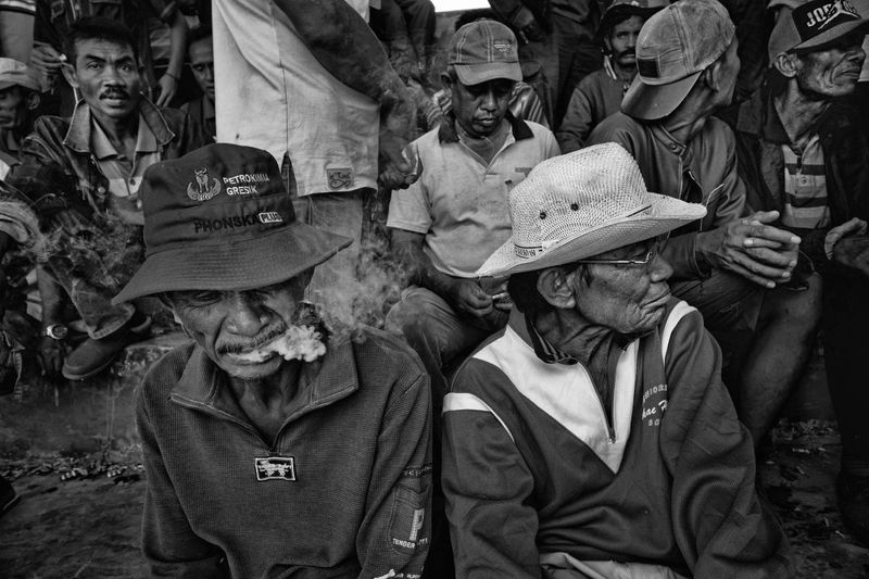 © Alain Schroeder - Indonesia, Sumbawa Island, Moyo, Men watching the races in the tribune.