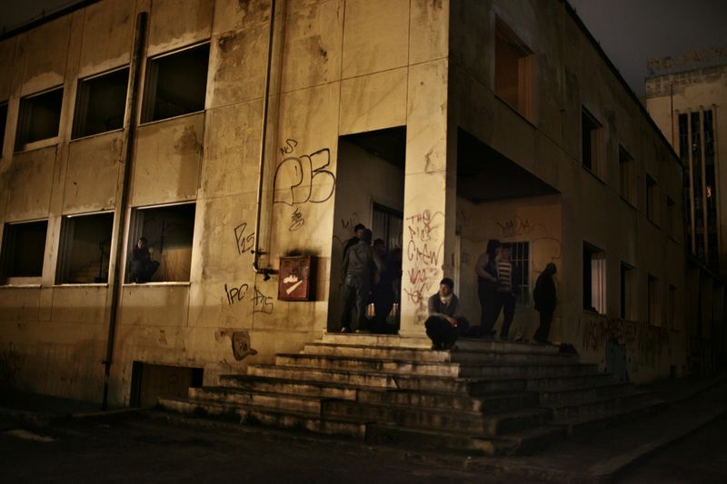 © Alessandro Penso - 2012. Patras. Greece. Migrants in an occupied factory in Patras.