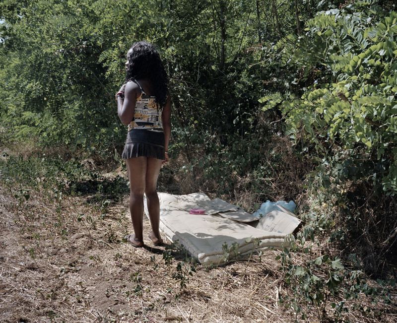 © Paolo Patrizi - Angela, a sex worker, stands by her makeshift bed, Rome, Italy